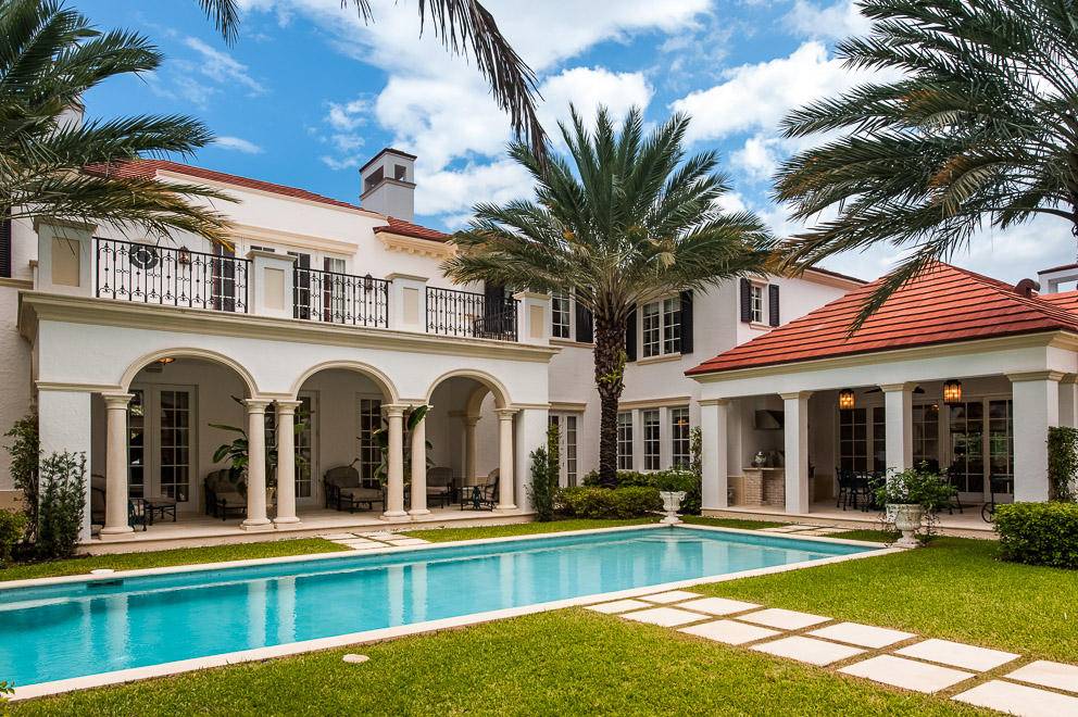 Exceptional Neoclassical British Colonial in desirable In Town location with 6BR 7.
