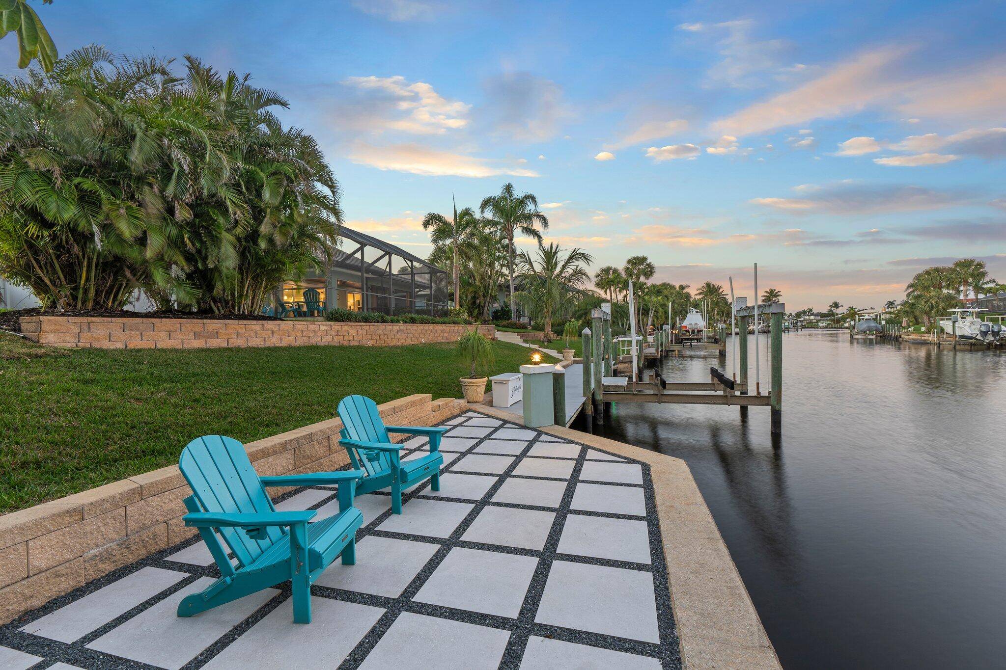 Stunning waterfront top down remodel in the sought after Yacht Country Club of Stuart !