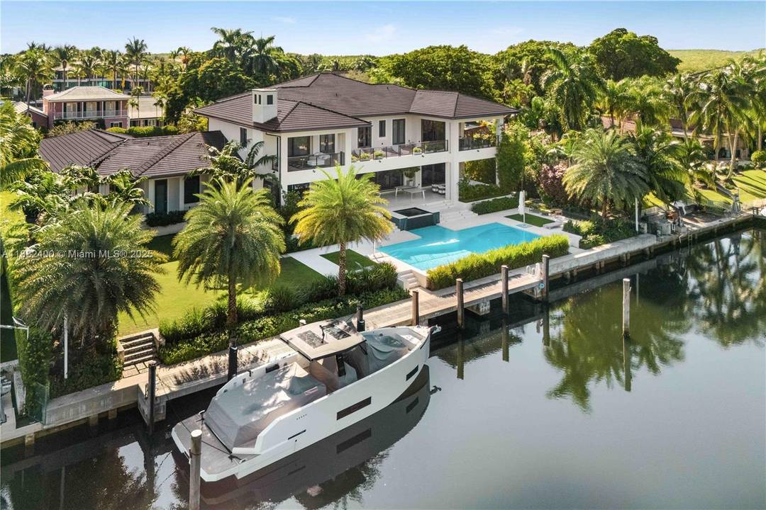 Introducing a rare opportunity to own a fully finished, turnkey waterfront estate within the prestigious, guard gated enclave of Old Cutler Bay, an address synonymous with privacy, security, and distinction.