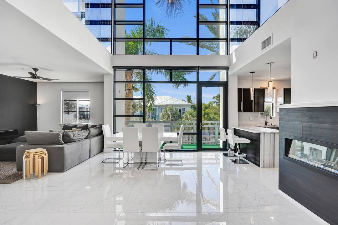 Experience the best of coastal living in this bright and modern 2 bed, 2 bath residence at Meridian Delray, just steps from Atlantic Ave's restaurants, boutiques, and world class beaches.