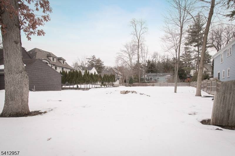 Rare to find level lot in extremely desirable Memorial Field location overlooking the park.