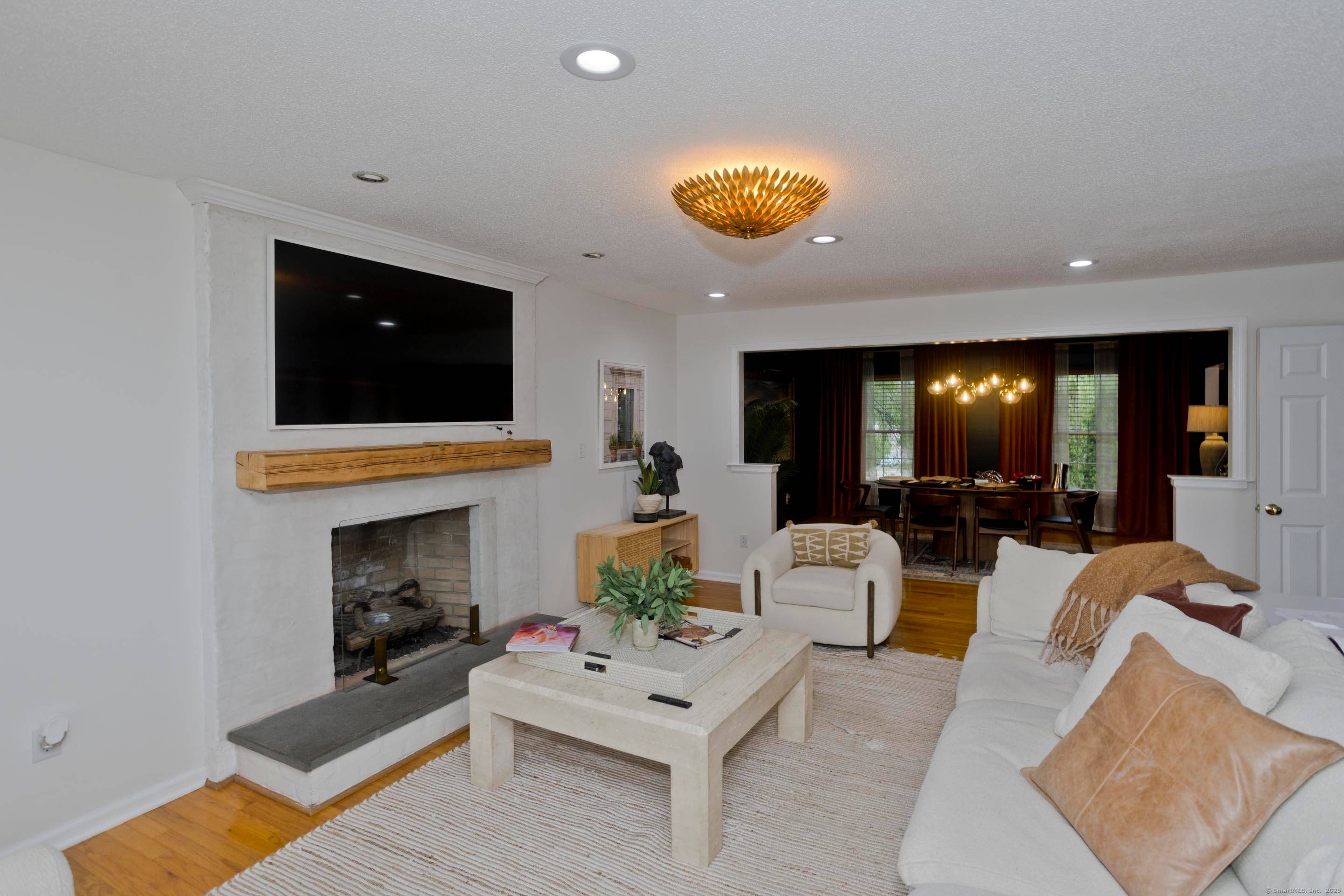 Stately, custom built Colonial nestled on a level lot with sweeping countryside views !