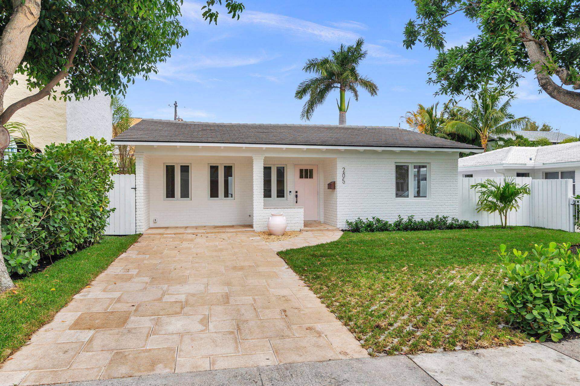 Completely renovated, redesigned and enlarged, this circa 1958 cottage in the Prospect Southland Park historic district is like new.