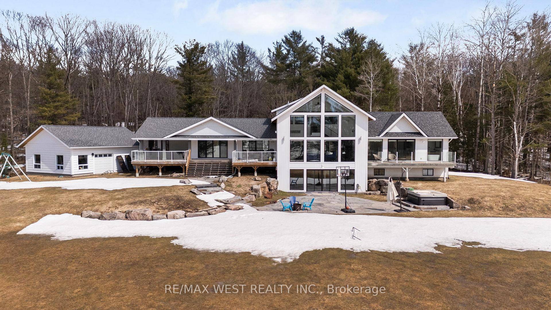 Welcome to 1331 South Monck Drive, an extraordinary Muskoka estate offering unparalleled privacy, luxury, and breathtaking lake views, spanning over 9 acres with 5, 546 sq ft of total living ...