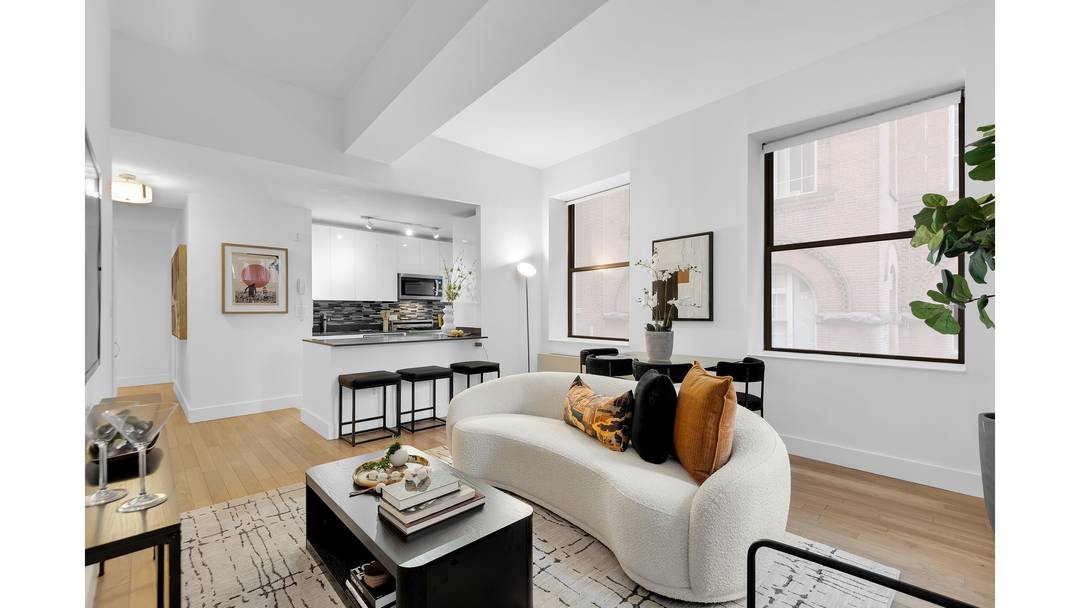 99 JOHN ST. This luxurious FiDi Loft checks all the boxes !