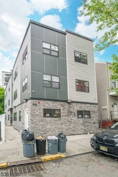 Beautiful new construction 6 unit apartment building with a 30 year tax abatement !