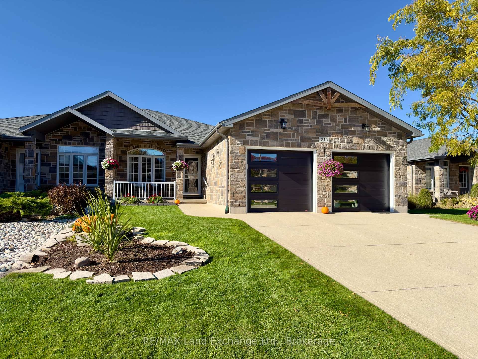 Immaculate freehold townhome built in 2013 at 210 Stickel Street in Port Elgin ; finished top to bottom.