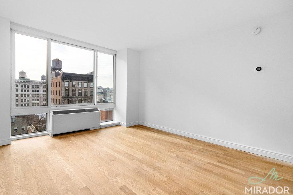 High floor South facing one bedroom home at The Caroline.