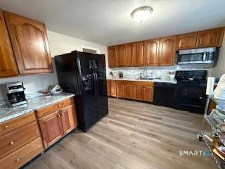 Spacious raised ranch in lovely Cranbury area of Norwalk.