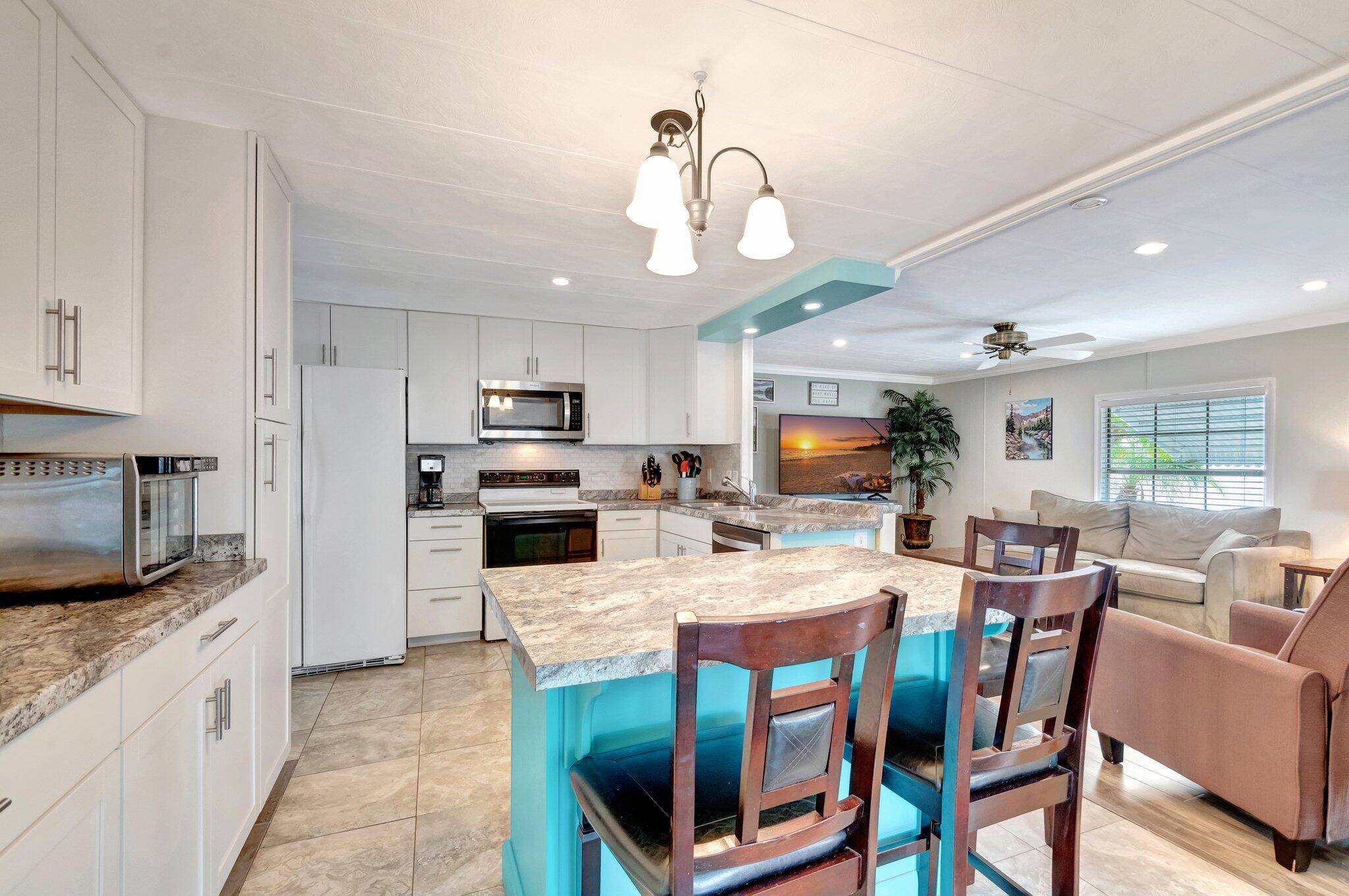 Renovated, furnished corner unit in the desirable 55 community of Jamaica Bay !
