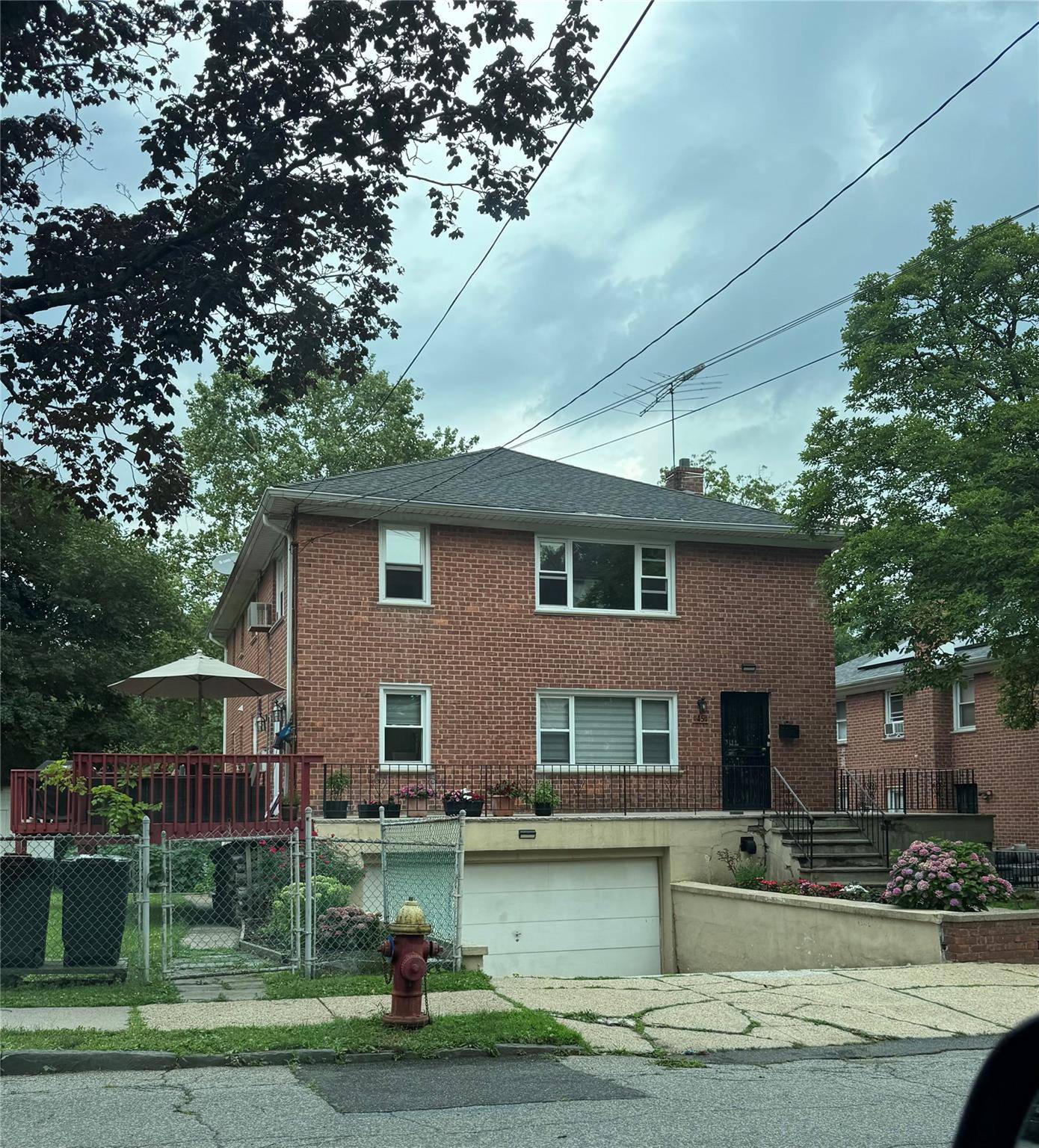 Welcome to this updated Colonial home with hardwood floors throughout and offers a bright living room, dining room, and a modern kitchen equipped with stainless steel appliances, ample counter space, ...
