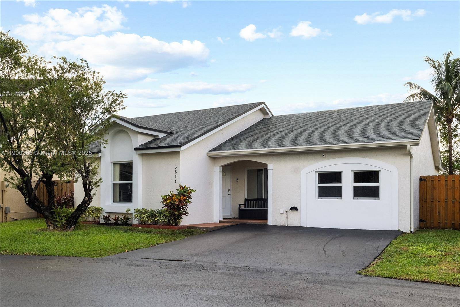 Charming One Story Home with Golf and Lake Views in Doral Park !