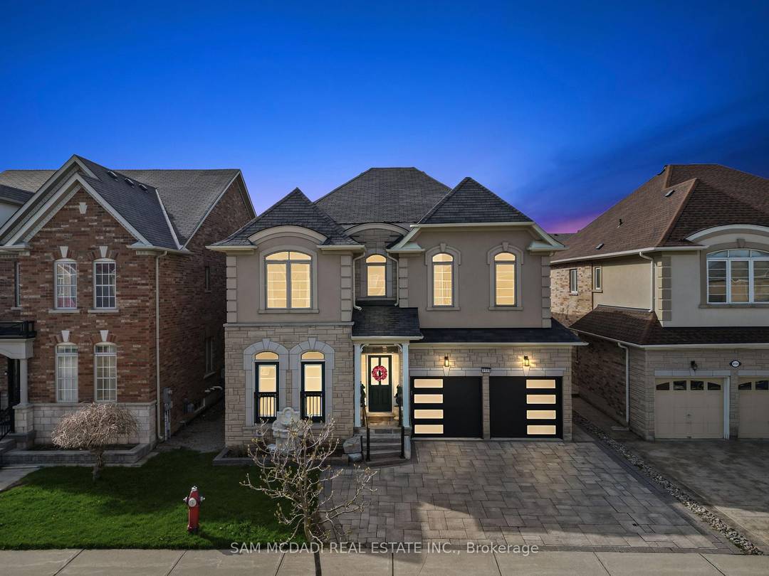 Welcome to this beautifully updated 4 1 bedroom, 5 bath home on a quiet street in the highly sought after Churchill Meadows community.