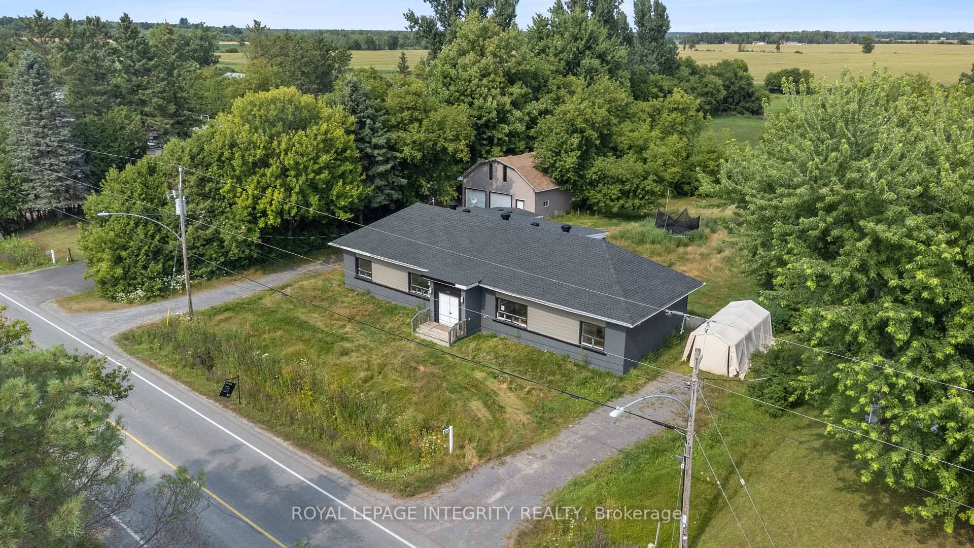 Updated and vacant side by side duplex with detached over sized double car garage amp ; loft sitting on a generous 0.