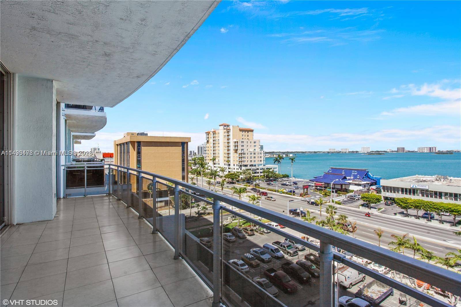 Opportunity to own a 2 bedroom den with 10 ft ceilings, impact windows and nice bay views.