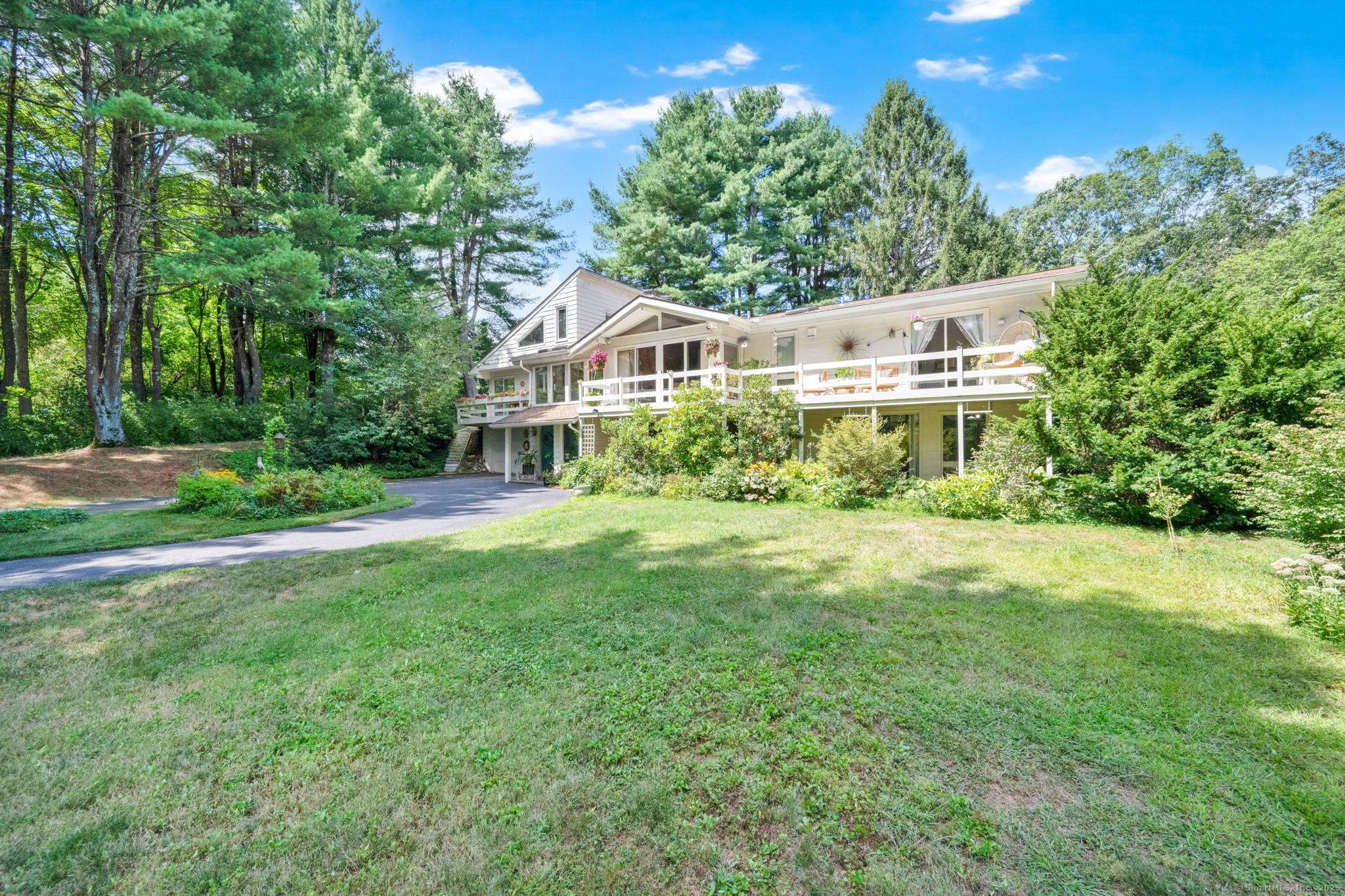 Introducing 26 Sunrise Drive a sprawling mid century modern home set on 2.