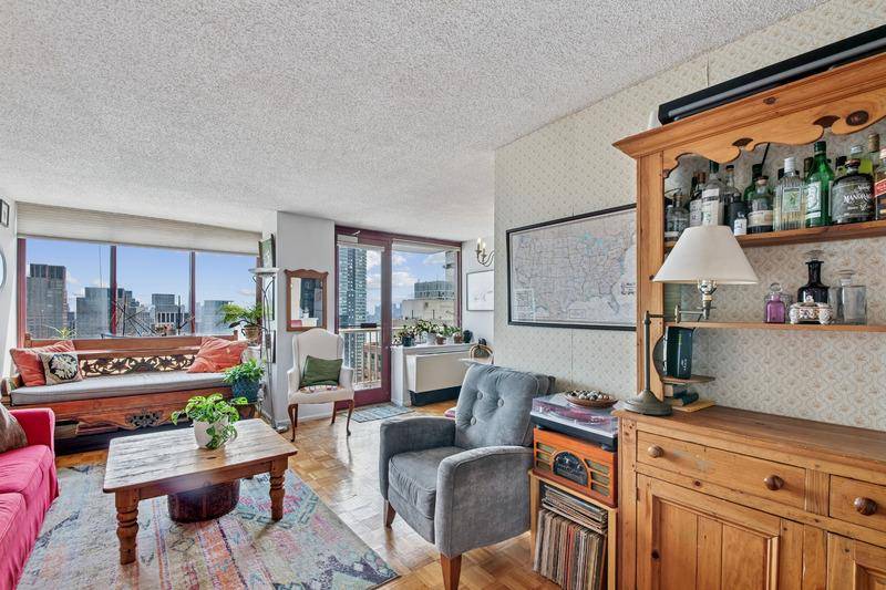 Breathtaking Southern Views of the Manhattan Skyline and East River greet you immediately upon entering this exquisite 2BR 2BA with Dining area and Balcony.