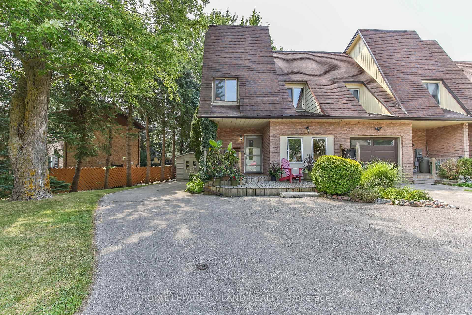 Welcome to 2030 Aldersbrookan end unit freehold townhome that radiates warmth, care, and pride of ownership.