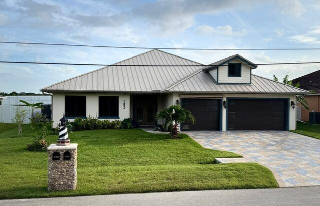 Rare home with Luxury Finishes 6 Car GarageDiscover this one of a kind custom built pool home nestled in a sought after Port Saint Lucie neighborhood spanning 2, 640 sq ...