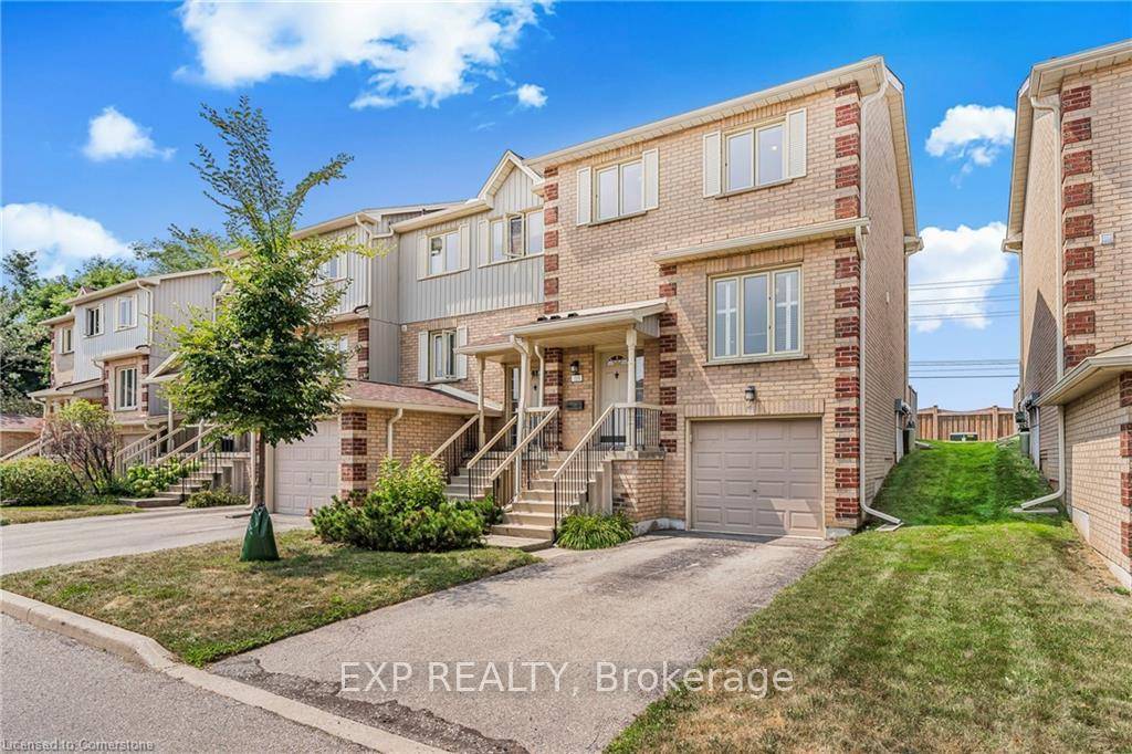 Upgraded End Unit Townhouse with Pool Access amp ; Prime Guelph Location !