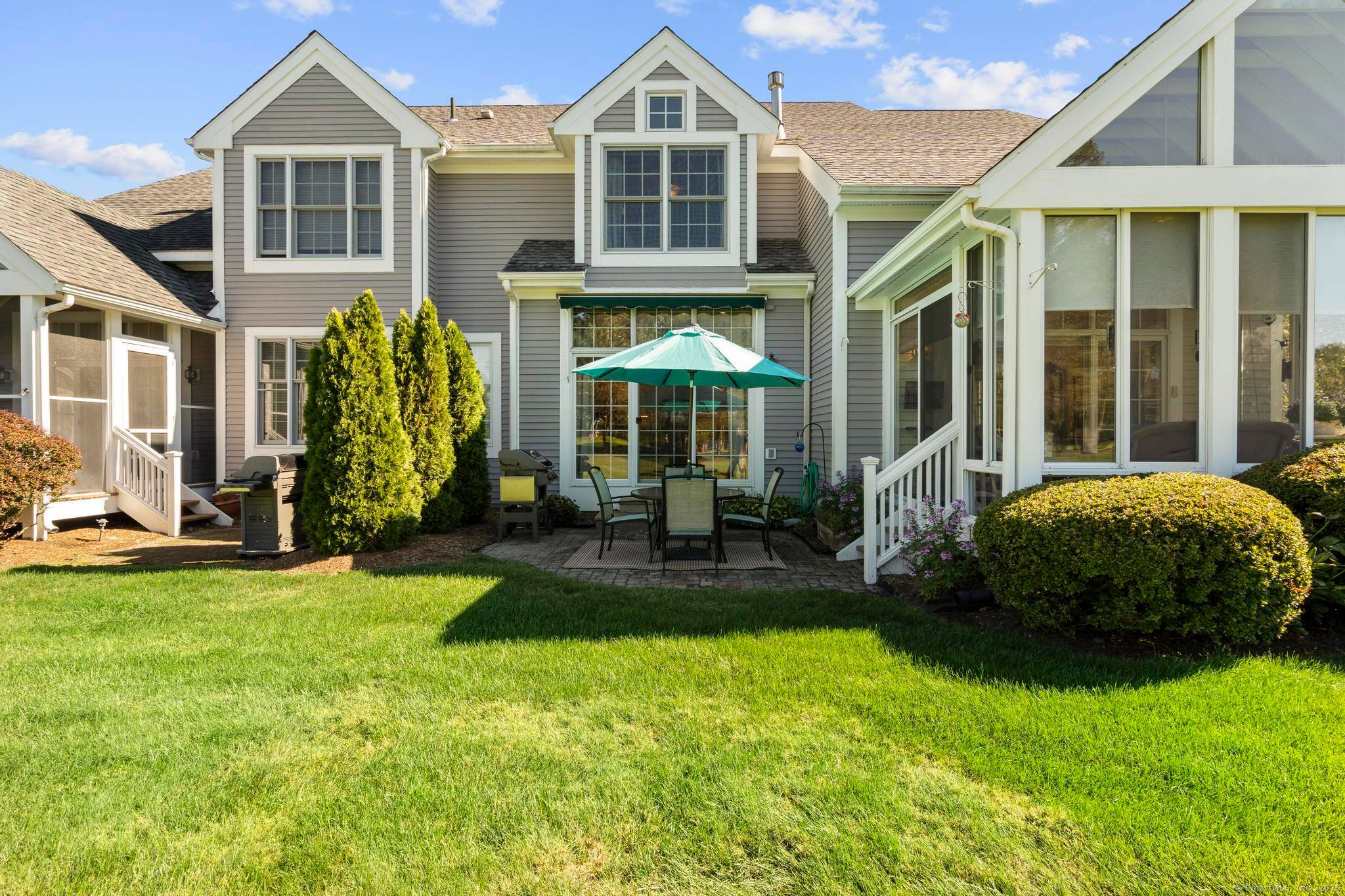Imagine stepping right off your patio onto the 6th tee at the prestigious TPC River Highlands golf course.