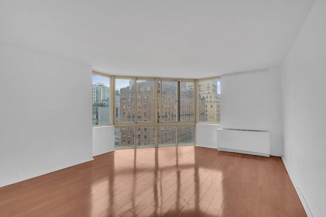 Oversized one bedroom, two bath residence offering approximately 952 square feet of beautifully proportioned living space with a large balcony and sliver view of Gramercy Park.