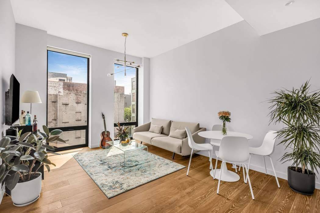 Residence 5C is a thoughtfully designed one Bedroom with South facing, floor to ceiling windows and soaring 10 ceilings.