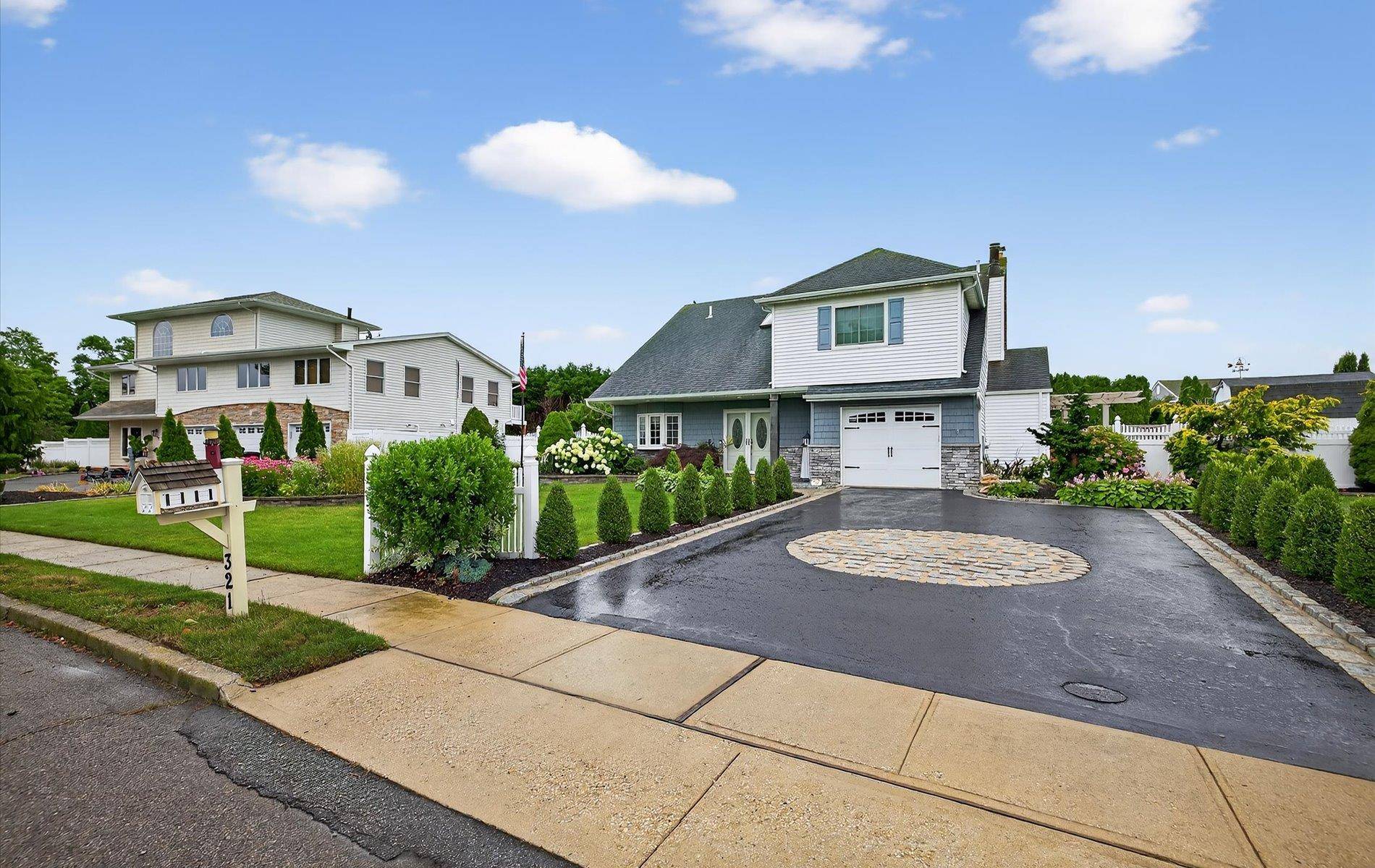 Coastal Contemporary Retreat with Private Beach Access of the Great South Bay.