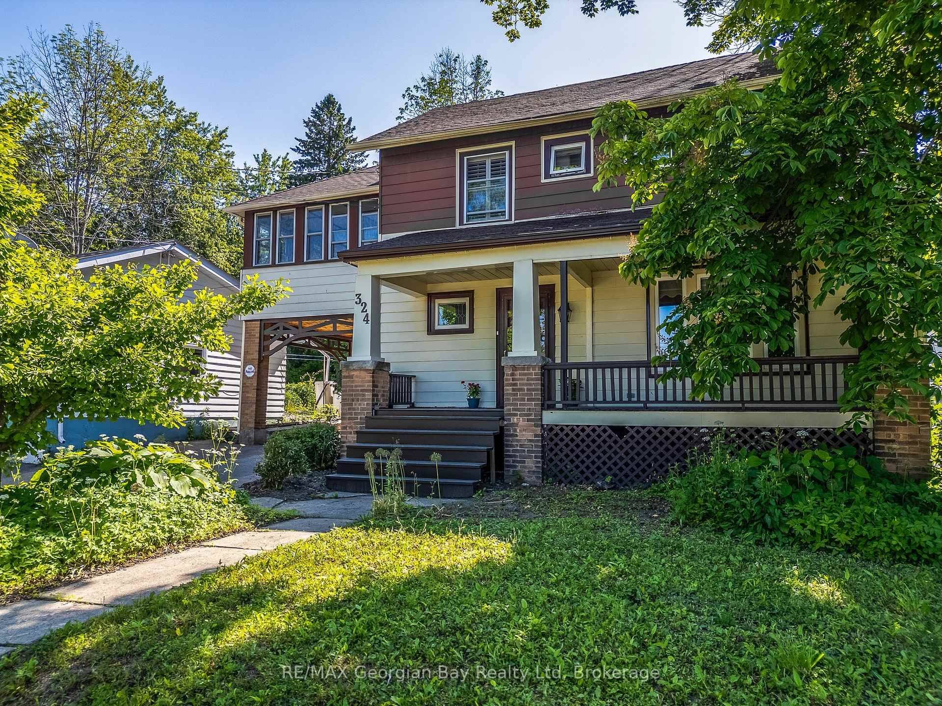 Charming Home with Versatile Living Spaces and Detached Double Car Shop Walking distance to Downtown !