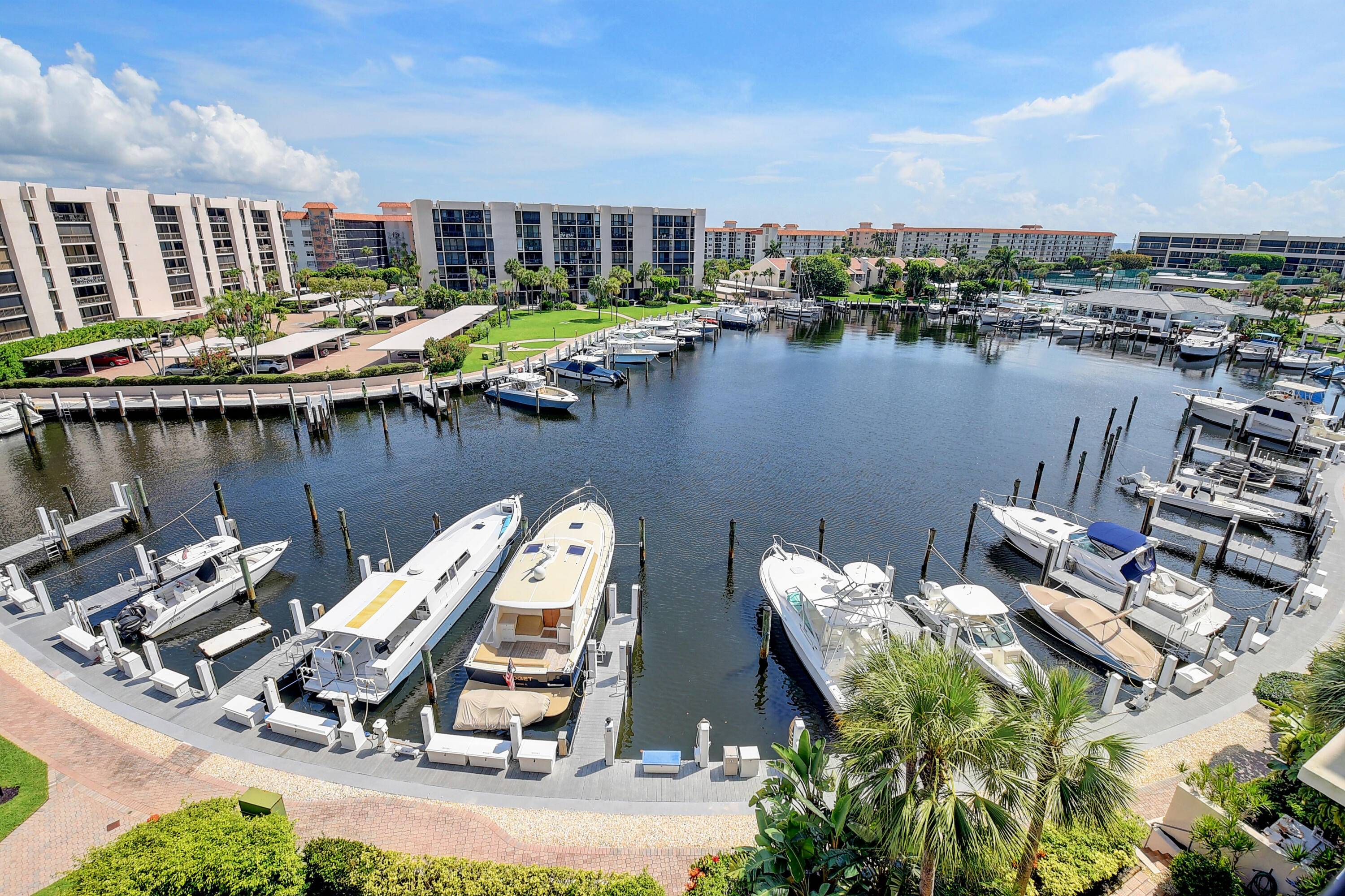 MAGNIFICENT 7TH FLOOR VIEWS OF THE INTRACOASTAL, MARINA AND OCEAN BY FAR ONE OF THE BEST VIEWS IN THE YACHT AND RACQUET CLUB FROM THIS 2 BEDROOM 2 BATH CONDO ...
