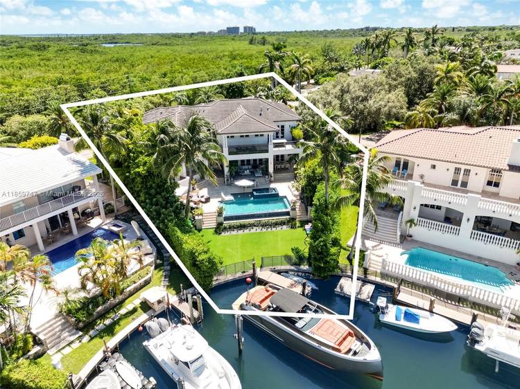 An exceptional waterfront estate offering sophisticated finishes, grand indoor and outdoor entertaining areas and direct access to Biscayne Bay.