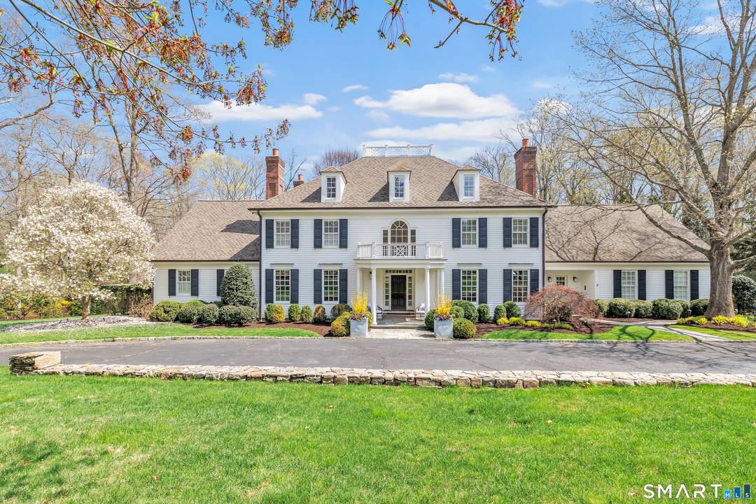 Tucked away on a quiet cul de sac in the heart of Greenfield Hill, this exceptional 7, 100 sqft estate is set on two meticulously landscaped acres, offering a rare ...