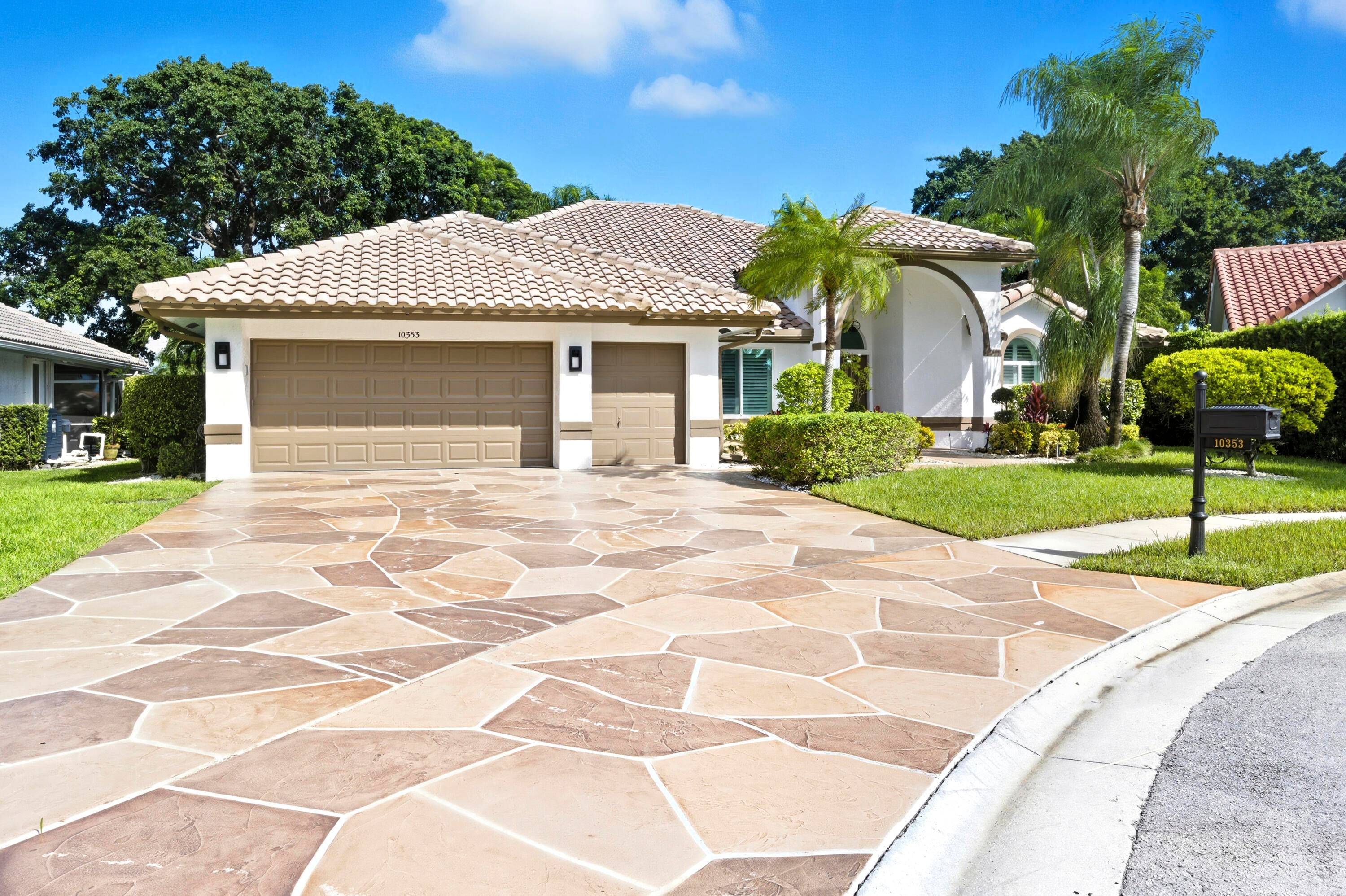 This stunning, fully renovated residence is nestled in a prestigious gated community on a tranquil cul de sac.