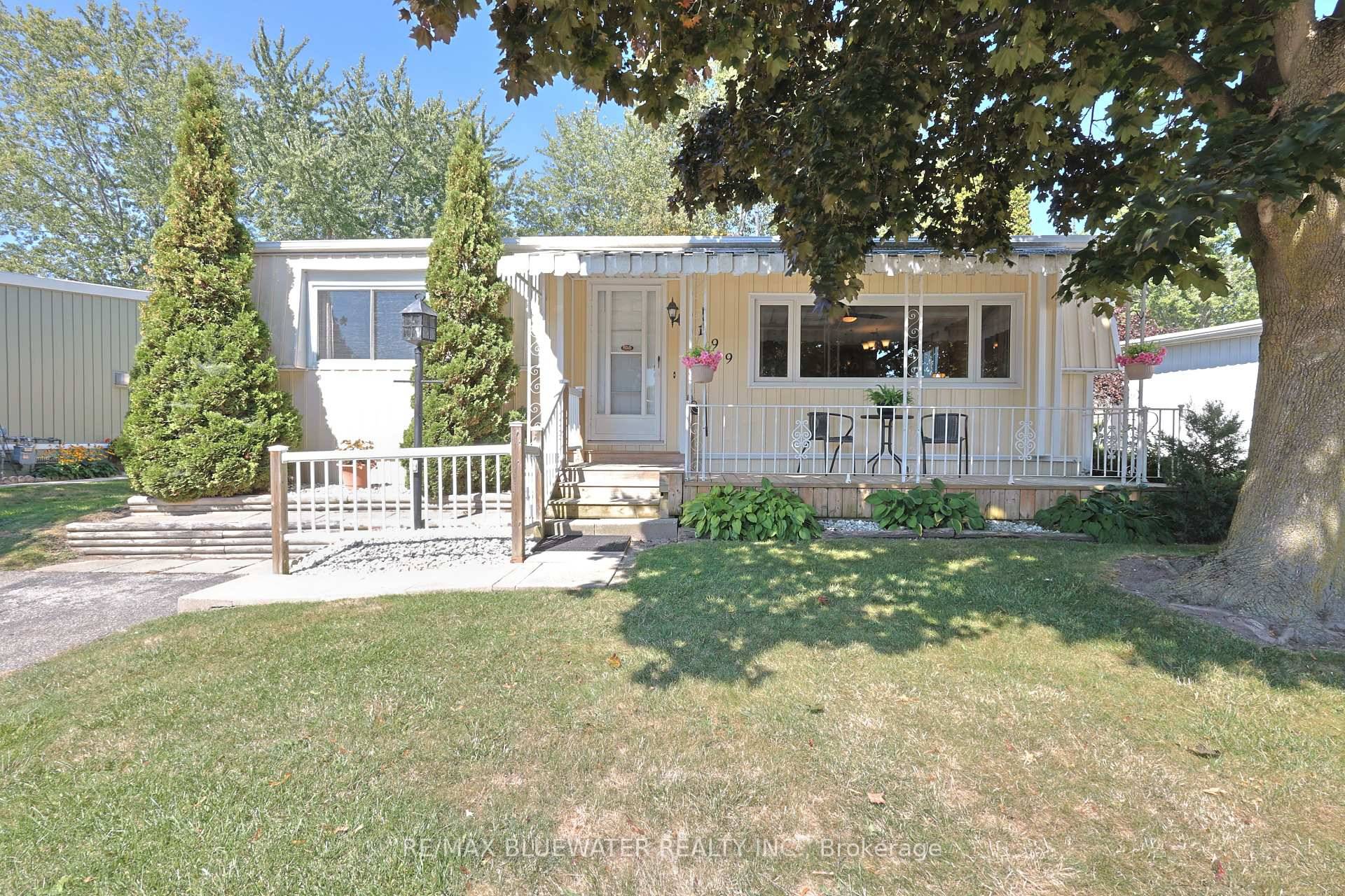 Welcome to 199 Pebble Beach Pkwy, Grand Bend in the 55 adult leased land community of Grand Cove Estates !