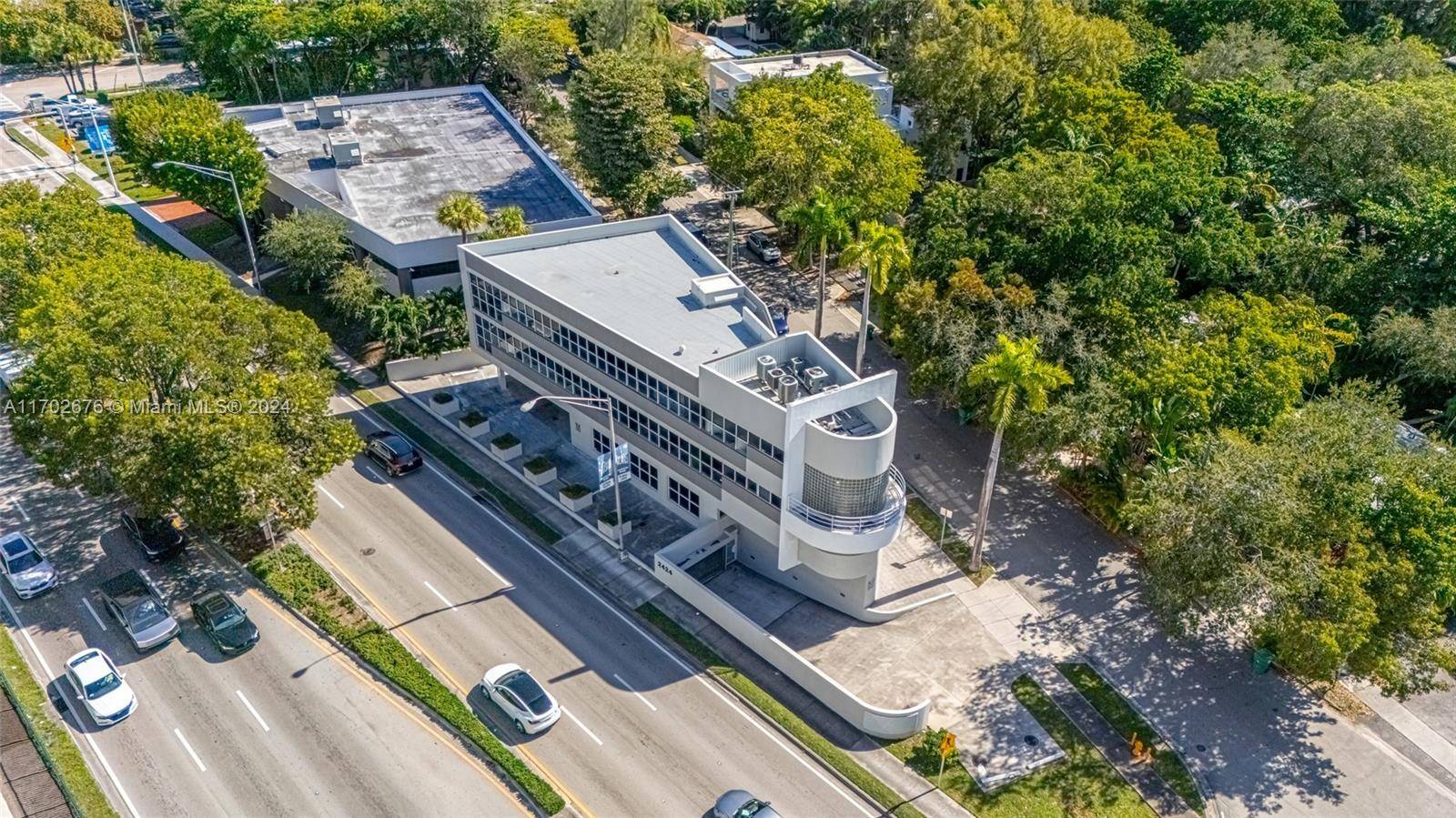 Located at 2424 South Dixie Hwy, this versatile, highly visible iconic landmark office building offers unparalleled flexibility and functionality.