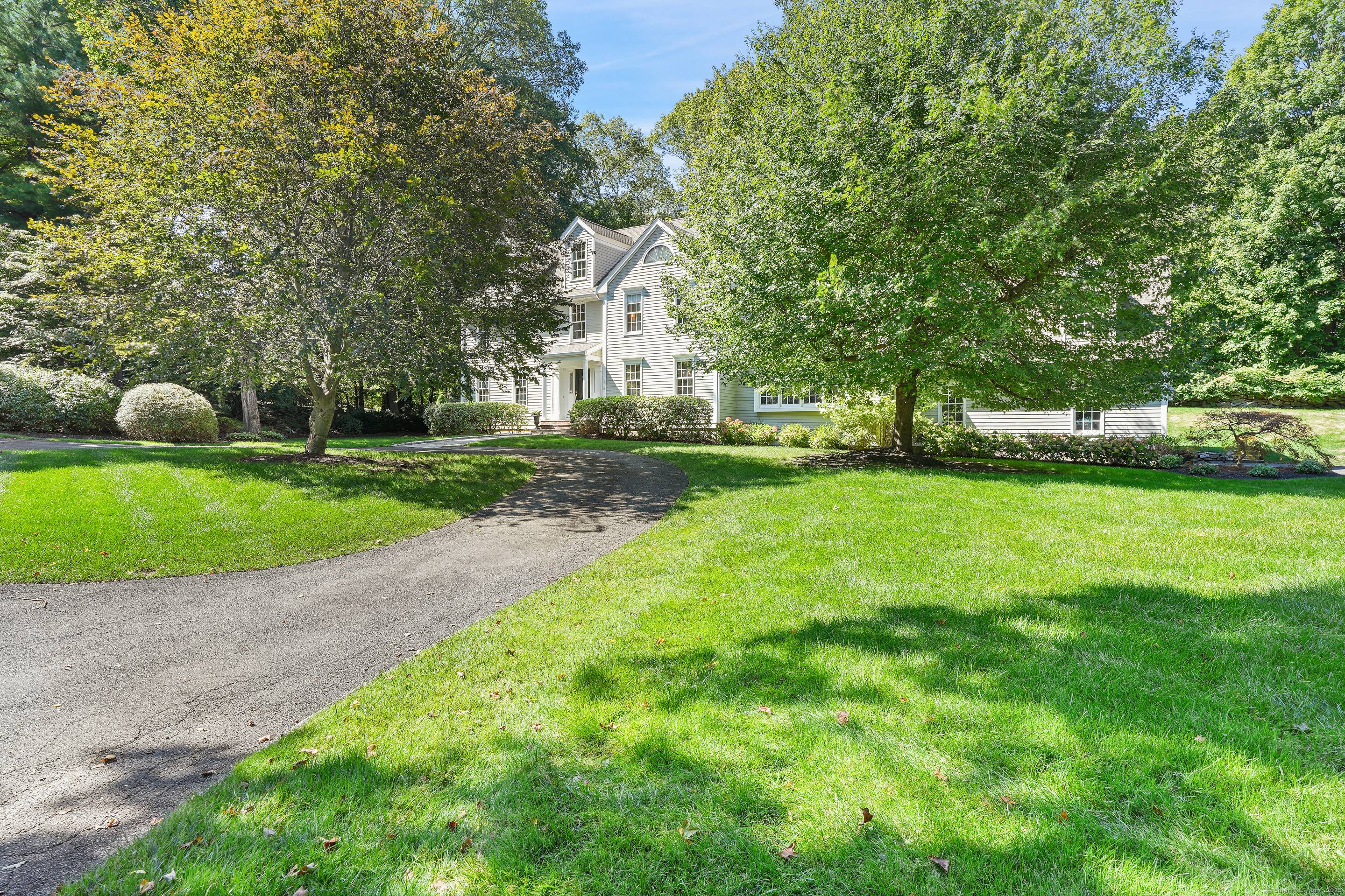 This sophisticated Colonial at 70 Branchville Road offers over 5, 000 square feet of beautifully designed living space on 1.
