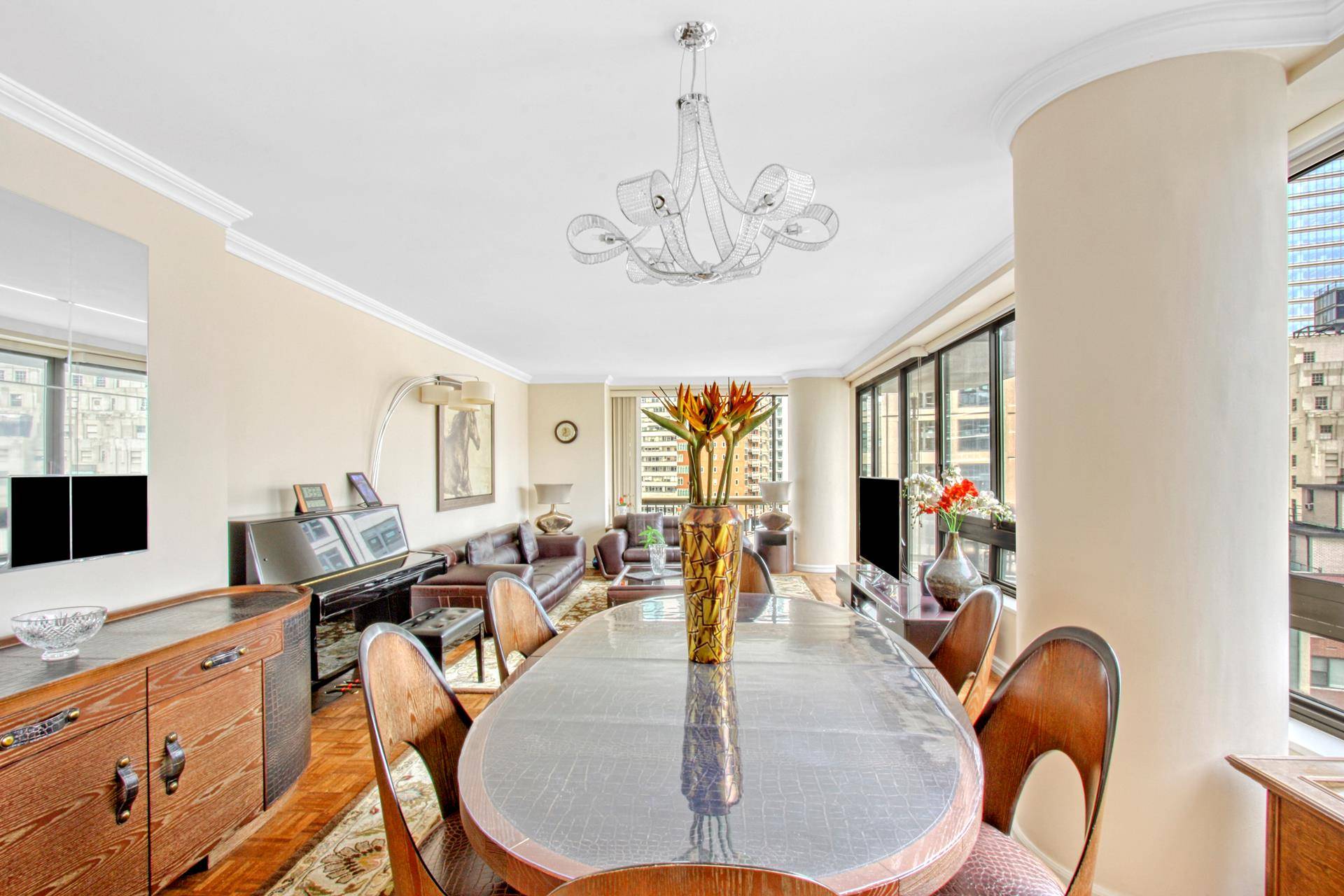 Make this elegant corner residence your new home in the heart of Lenox Hill !