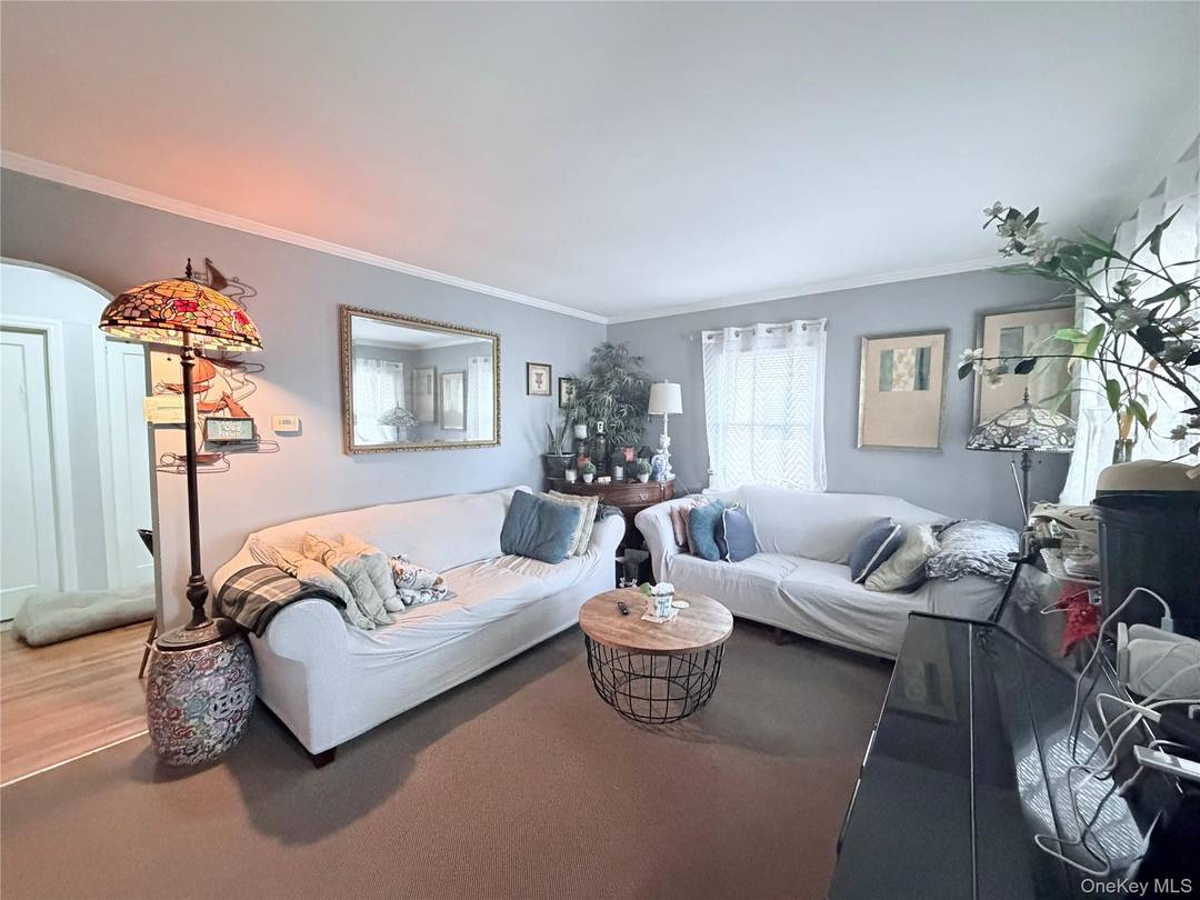 Charming Cape Situated In A Lovely Quiet Block Featuring Living Room, Formal Dining Room, Three Bedrooms And One Bath.