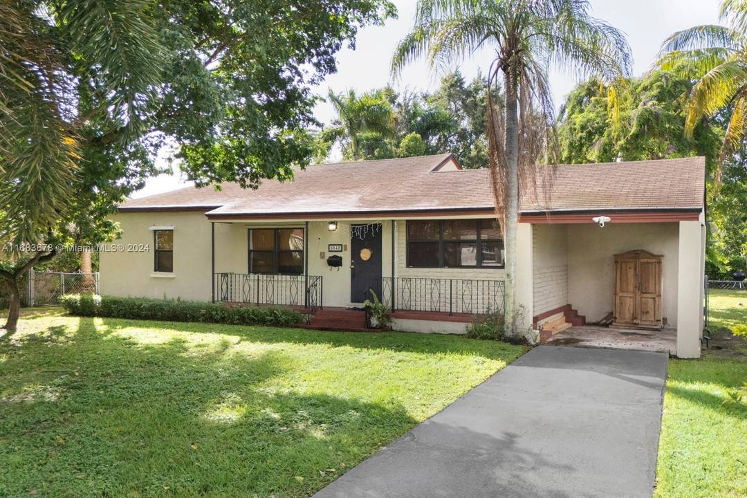 Centrally located and brimming with potential, this two bedroom single family home with a spacious den is within walking distance of the University of Miami.
