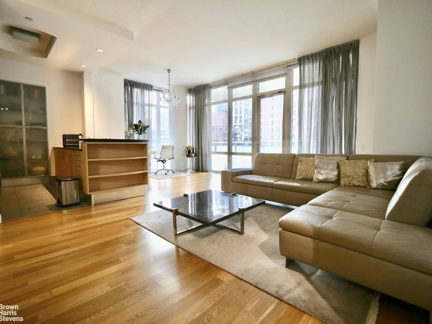 Live in this two bedroom two bath apartment with a balcony looking out to Empire State Building.