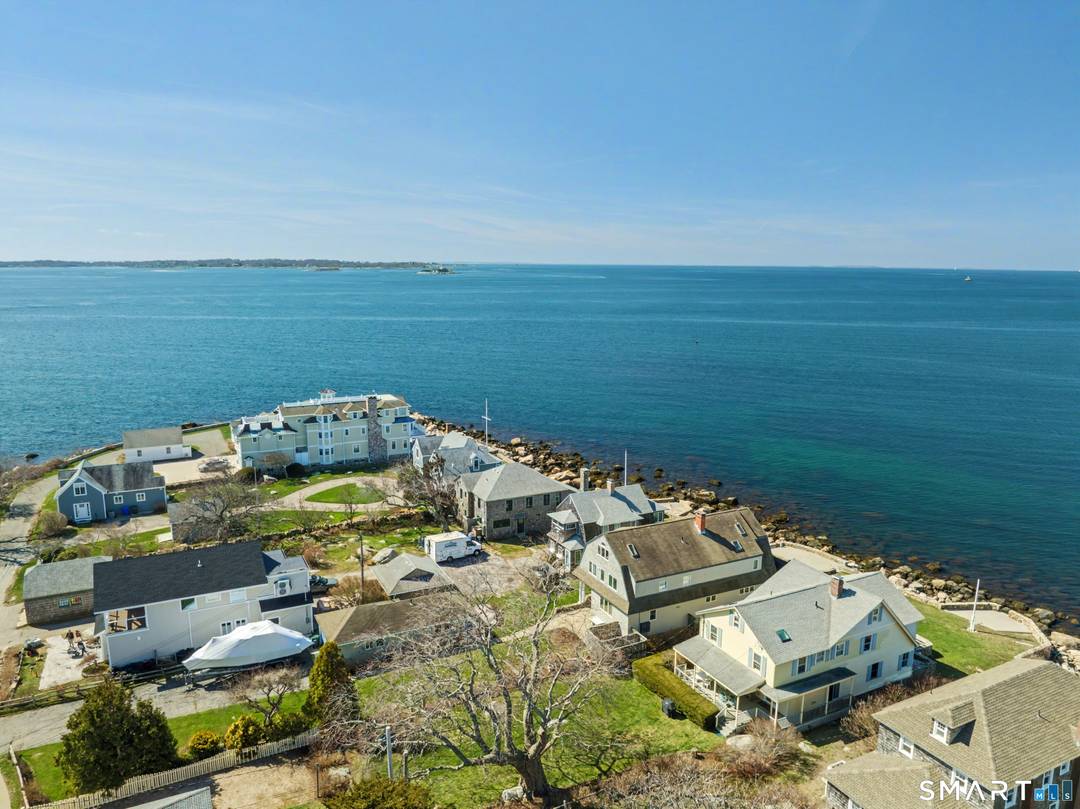 Experience coastal living at its finest with this direct waterfront rental in Groton Long Point.