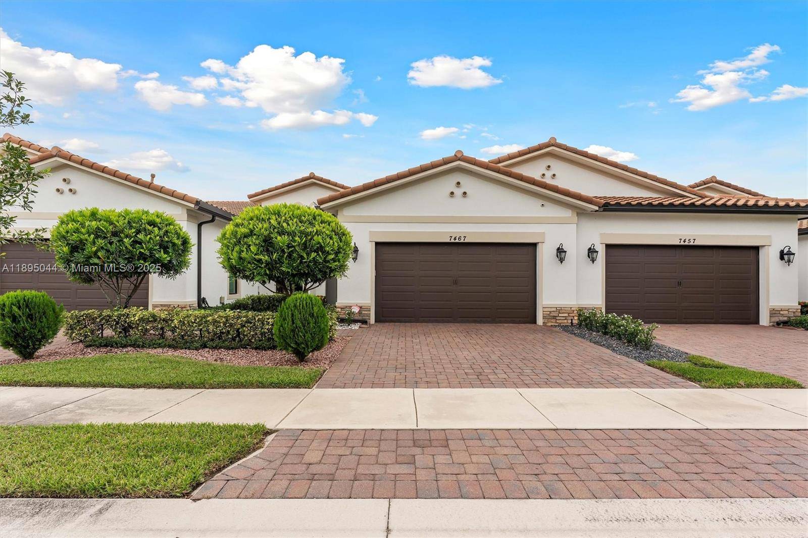 Located in the prestigious gated community of The Falls at Parkland, this beautifully upgraded home features 15K in lush landscaping and an extended private patio perfect for entertaining.