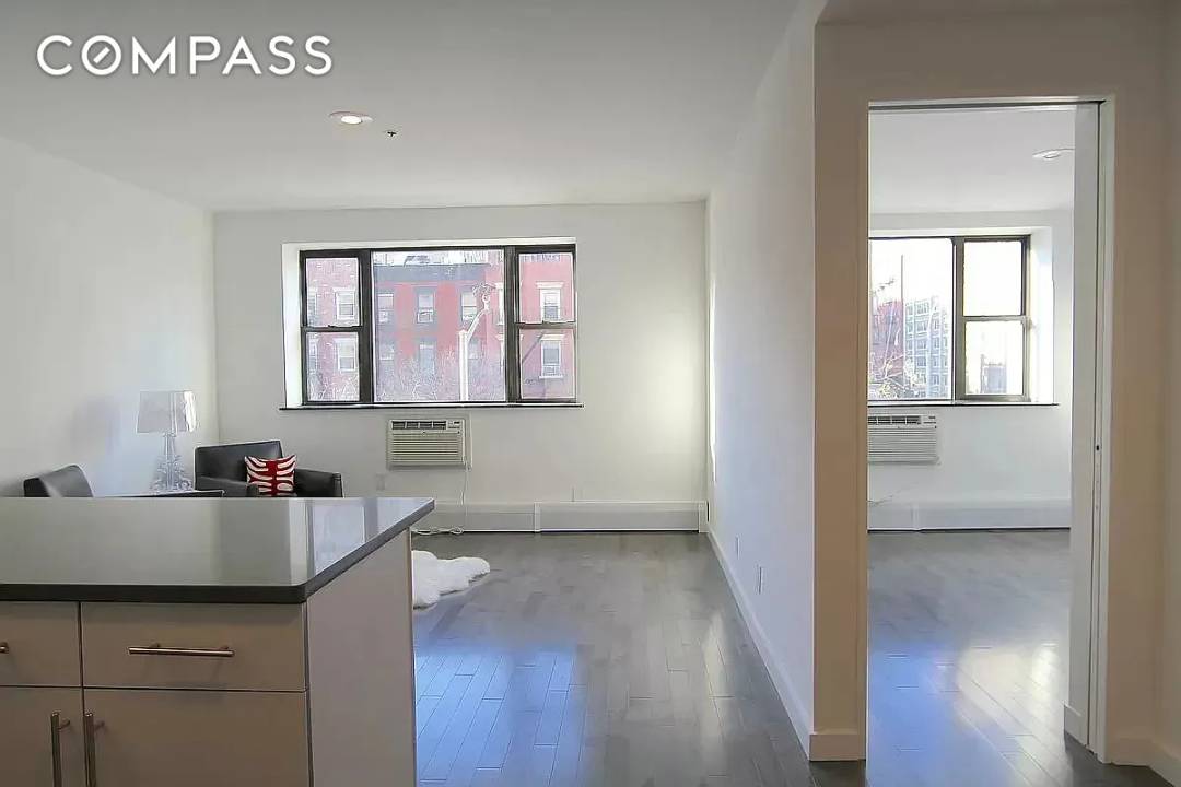 Meticulously designed, light filled, gut renovated 1 bedroom condo apartment in the center of the booming East Village.