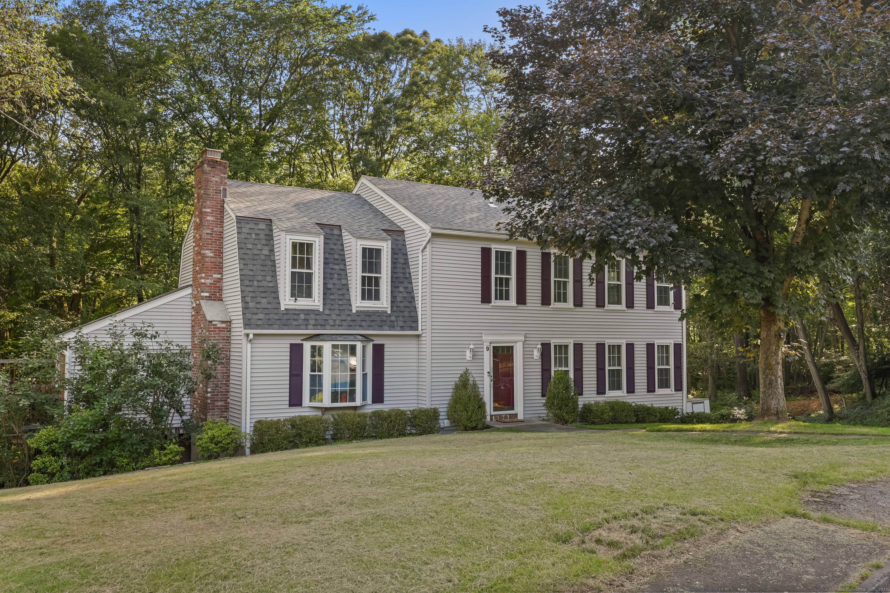 Colonial in one of Norwalk's most desirable and serene neighborhoods, this spacious 4 bedroom, 2.