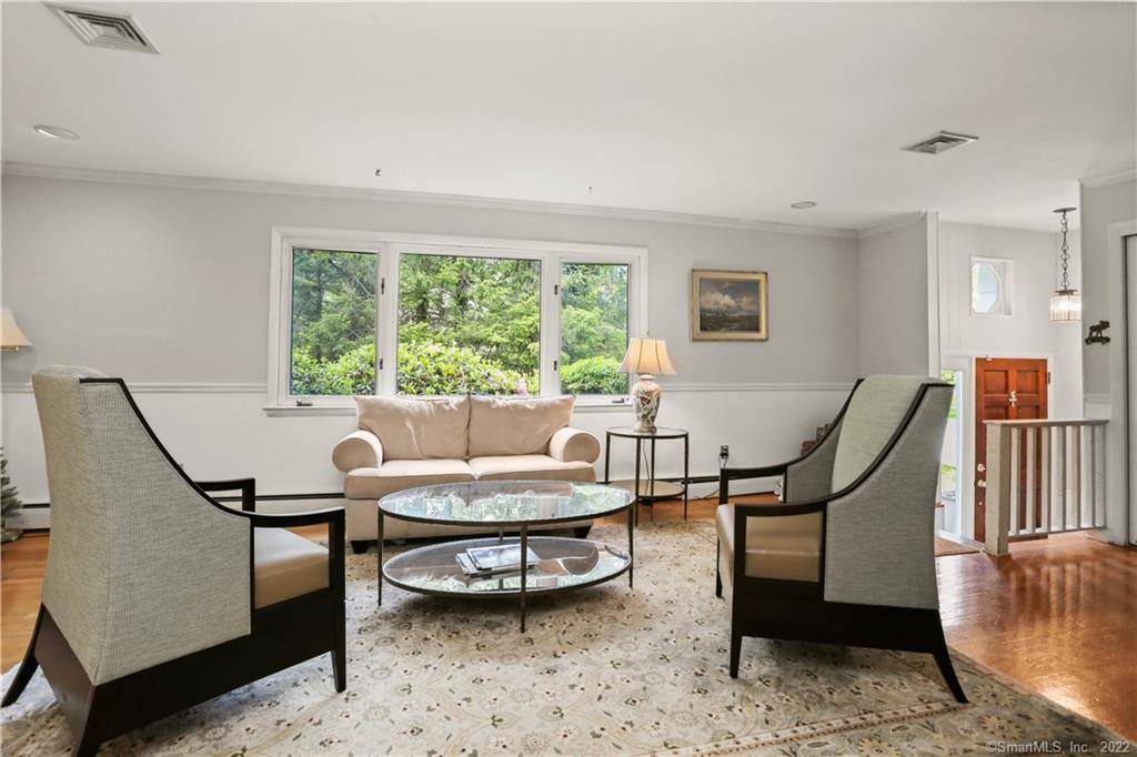 Discover this 4 bedroom home, tucked away on a quiet cul de sac close to train, beach and all Westport amenities.