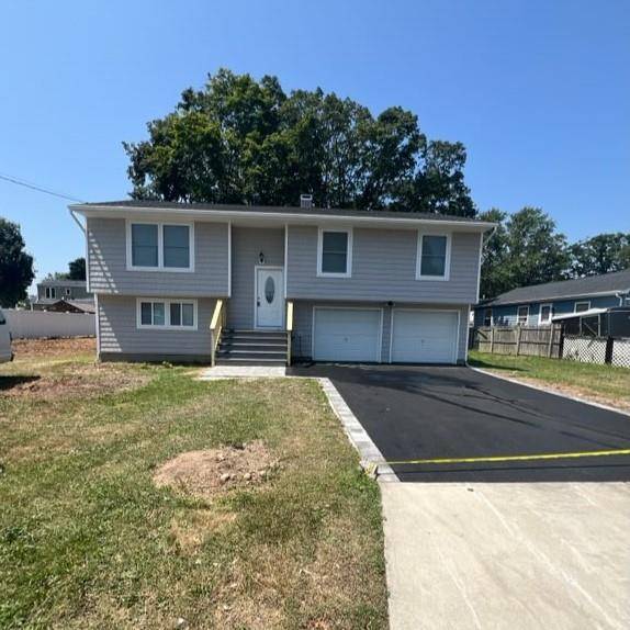 Renovated Hi Ranch, New Roof, Siding, Windows, Doors, Kitchen, Baths, Asphalt Driveway, Brick Stoop and More.