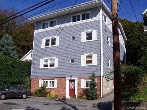 Nestled in The Heart Of Northport Village Living Large in this Penthouse Rooftop !