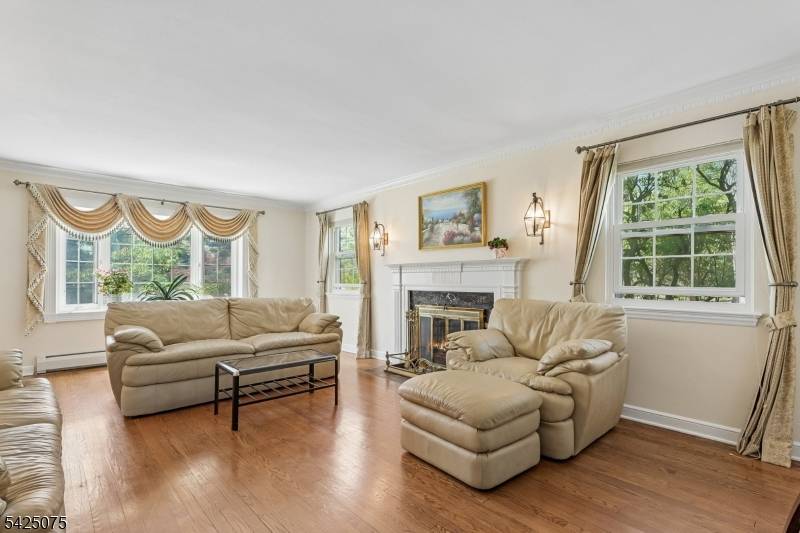 Tucked away on a quiet cul de sac in the highly desirable Deerfield section of Short Hills rests this 5 bedroom, 3 1 2 bath classic center hall Colonial.