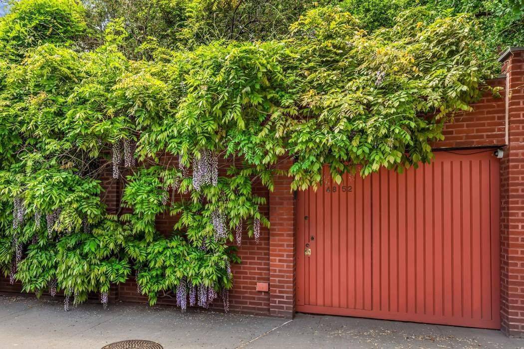 WEST VILLAGE COMPOUND The magic begins when you open the door and discover two adjoining Bedford Street Historic West Village townhouses that lead to two bountifully landscaped secret gardens revealing ...