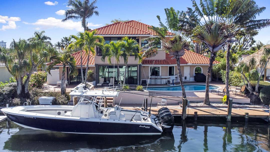 With 80 feet of deep water frontage on one of Pompano Beach s most desirable wide canals, this two story residence offers true boating freedom.